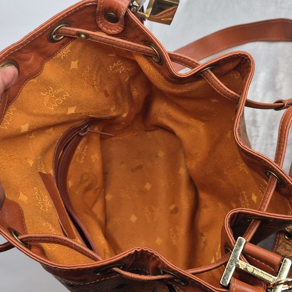 MCM Cognac Leather Drawstring Shoulder Crossbody Bucket Bag with Charm - Picture 12 of 17